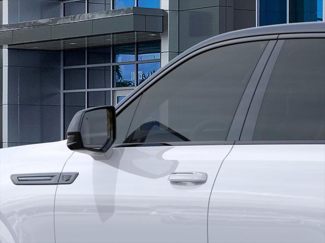 Photo of 2025 Summit White Cadillac Escalade IQ
