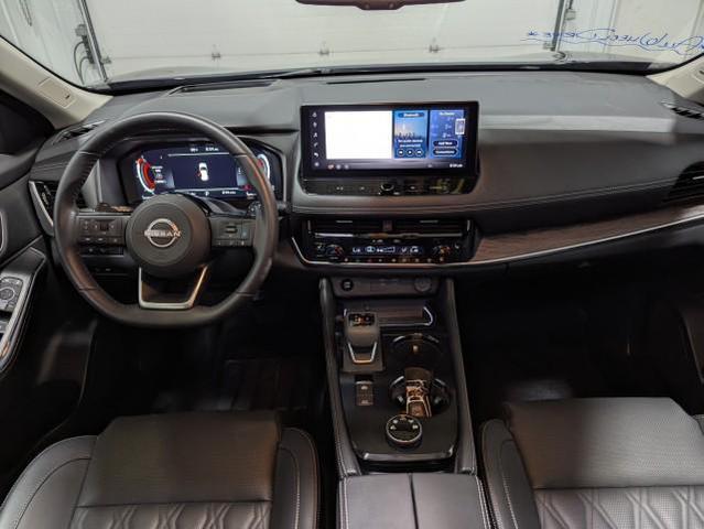 Photo of 2024 Deep Ocean Blue Pearl/Super Black Nissan Rogue