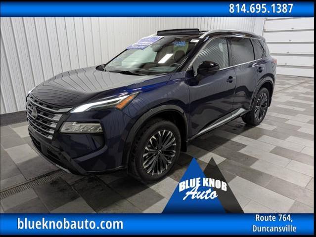 Photo of 2024 Deep Ocean Blue Pearl/Super Black Nissan Rogue