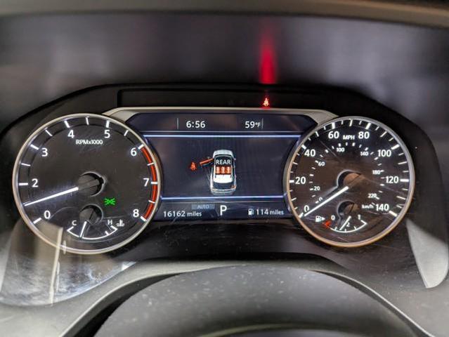 Photo of 2023 Pearl White Tricoat/Super Black Nissan Rogue