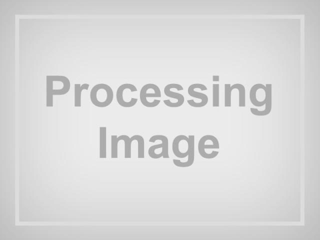 Photo of 2025 Midnight Black Metallic Toyota Corolla Hybrid