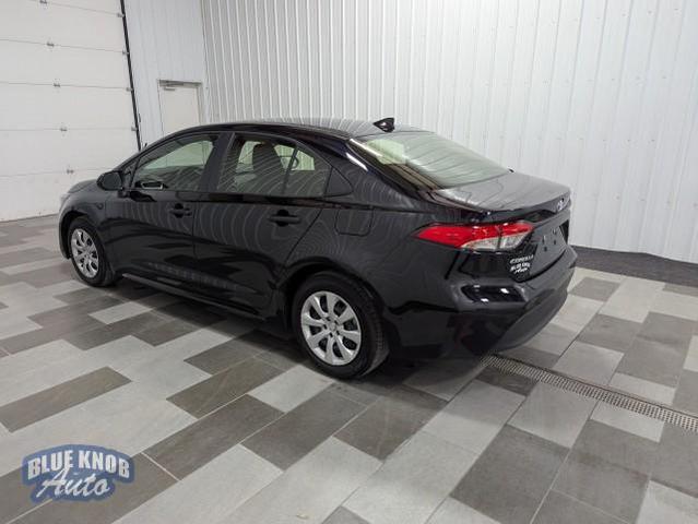 Photo of 2025 Midnight Black Metallic Toyota Corolla Hybrid