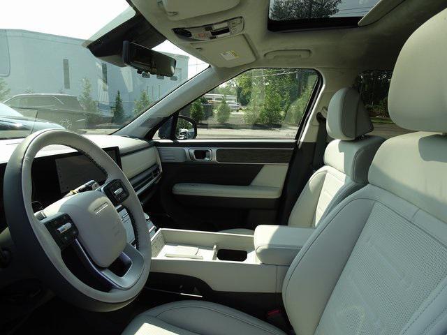 Photo of 2025 Atlantic Blue Hyundai SANTA FE HEV