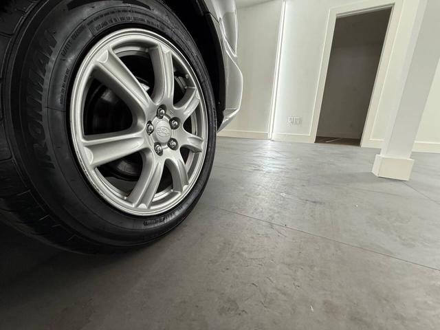 Photo of 2006 Regal Blue Pearl/Steel Gray Metallic Subaru Impreza