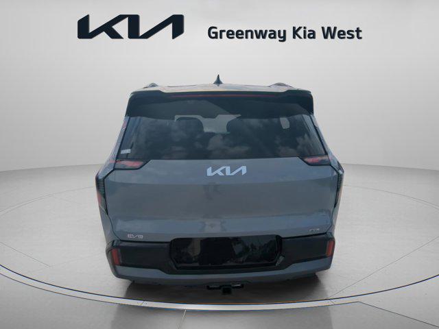 Photo of 2026 Wolf Gray/Ebony Black Roof Kia EV9