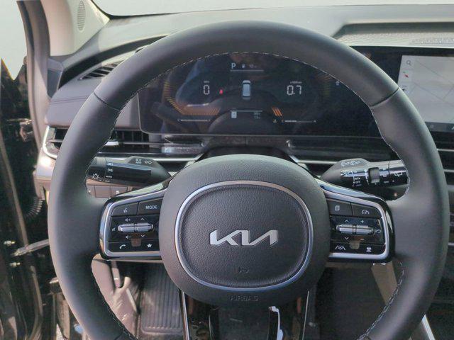 Photo of 2026 Aurora Black Pearl Kia Carnival