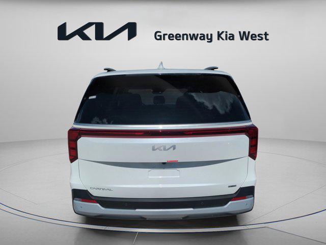 Photo of 2026 Snow White Pearl Kia Carnival Hybrid