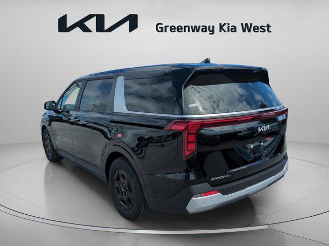 Photo of 2026 Aurora Black Pearl Kia Carnival