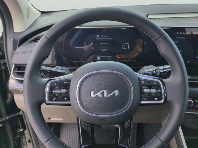 Photo of 2026 Aurora Black Pearl Kia Carnival