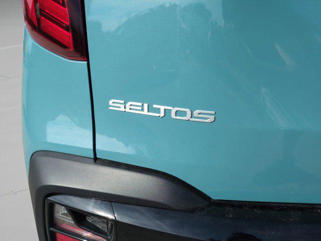 Photo of 2025 Pluton Blue/Black Roof Kia Seltos
