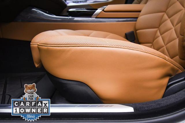Photo of 2024 Mineral White Metallic BMW 740
