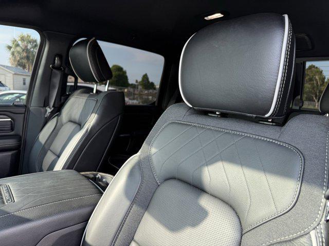 Photo of 2025 Diamond Black Crystal Pearlcoat RAM 1500