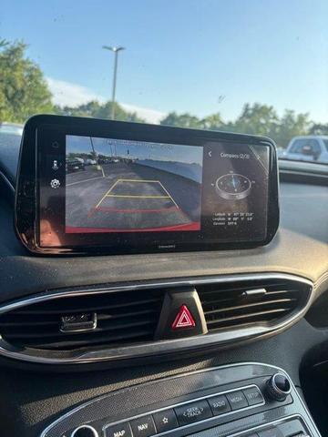 Photo of 2023 Calypso Red Hyundai SANTA FE