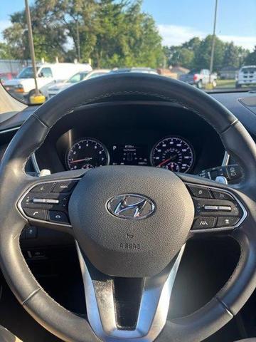 Photo of 2023 Calypso Red Hyundai SANTA FE