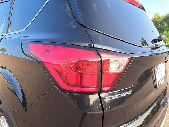 Photo of 2019 Agate Black Metallic Ford Escape