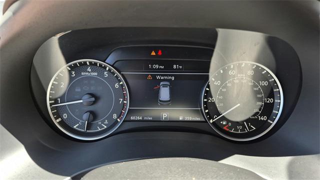 Photo of 2023 Aspen White Tricoat Nissan Armada