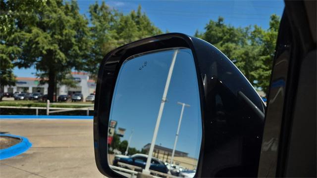 Photo of 2023 Aspen White Tricoat Nissan Armada