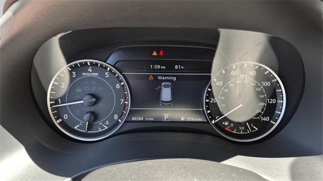 Photo of 2023 Aspen White Tricoat Nissan Armada