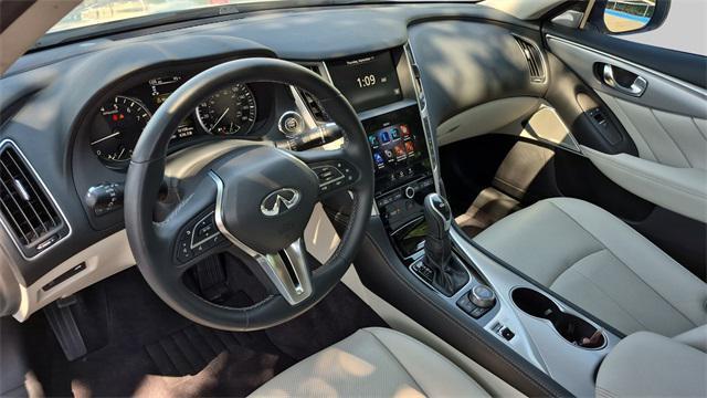 Photo of 2024 Majestic White INFINITI Q50