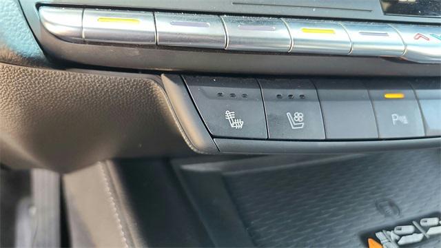 Photo of 2023 Summit White Cadillac CT4
