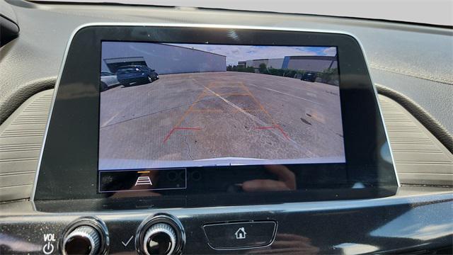 Photo of 2023 Summit White Cadillac CT4