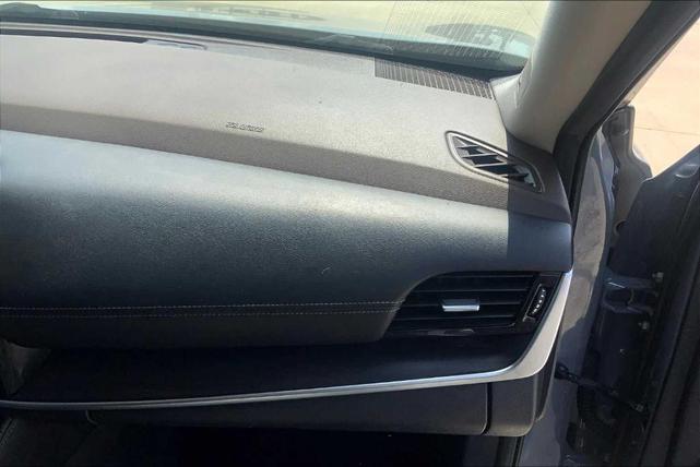 Photo of 2023 Boulder Gray Pearl Nissan Rogue