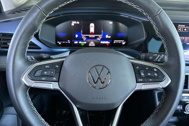 Photo of 2024 Dusk Blue Metallic Volkswagen Taos