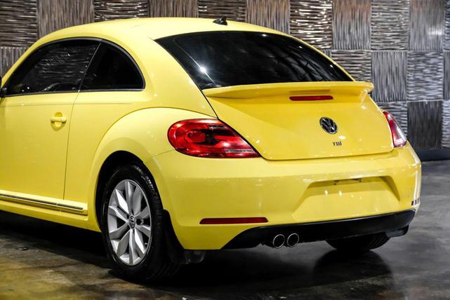 Photo of 2014 Yellow Rush Volkswagen Beetle