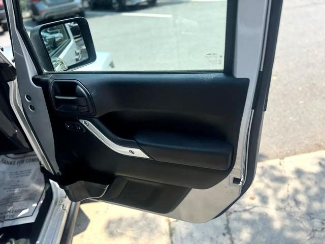 Photo of 2012 Bright Silver Metallic Clearcoat Jeep Wrangler Unlimited