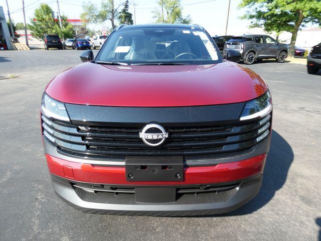 Photo of 2025 Scarlet Ember Tintcoat/Super Black Nissan Kicks