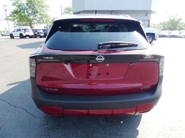 Photo of 2025 Scarlet Ember Tintcoat/Super Black Nissan Kicks