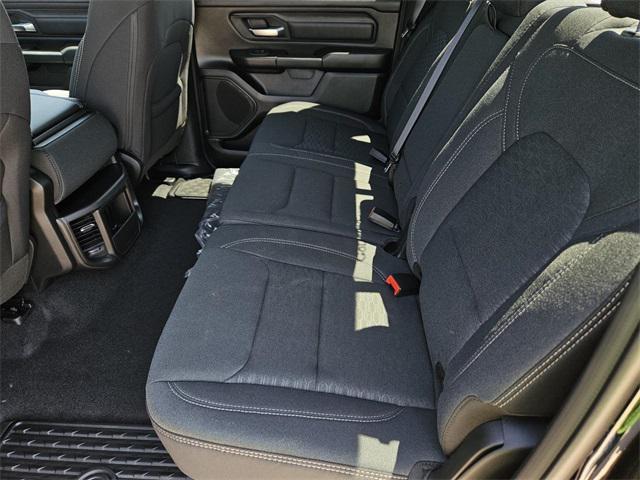Photo of 2025 Diamond Black Crystal Pearlcoat RAM 1500