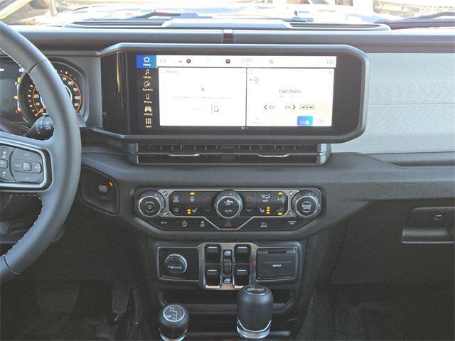 Photo of 2025 Fathom Blue Pearlcoat Jeep Wrangler