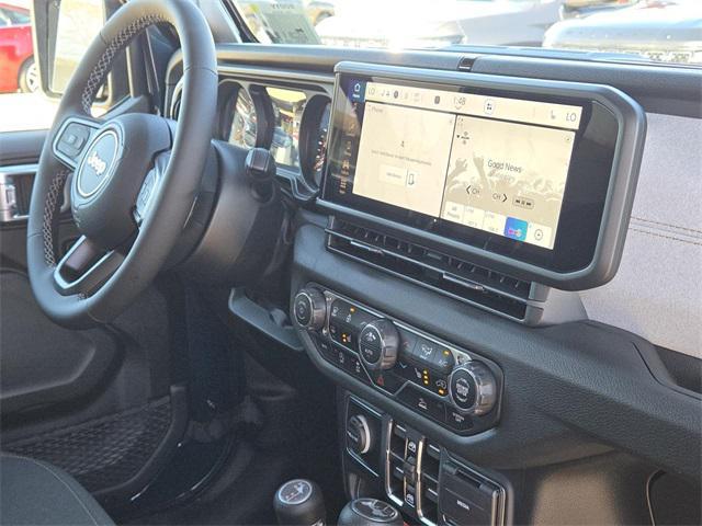 Photo of 2025 Fathom Blue Pearlcoat Jeep Wrangler