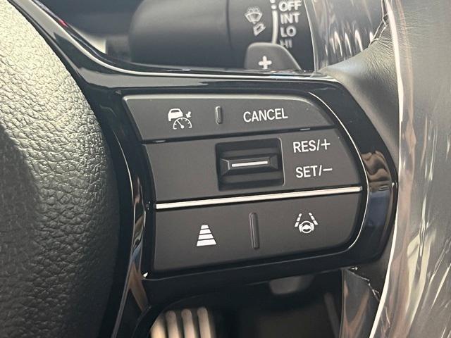 Photo of 2025 Boost Blue Pearl Honda Civic