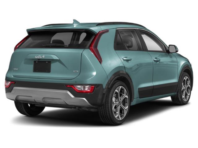 Photo of 2025 Cityscape Green Kia Niro