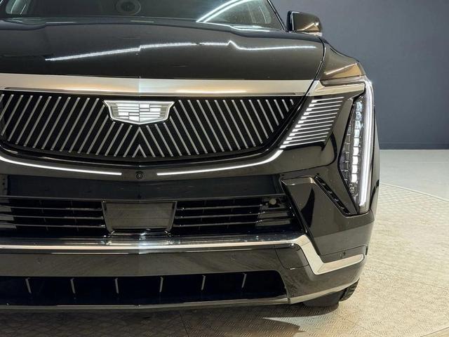 Photo of 2025 Black Raven Cadillac Escalade IQ