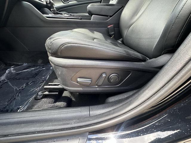 Photo of 2023 Ebony Black Kia Sportage