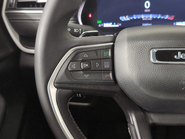 Photo of 2024 Diamond Black Crystal Pearlcoat Jeep Grand Cherokee L