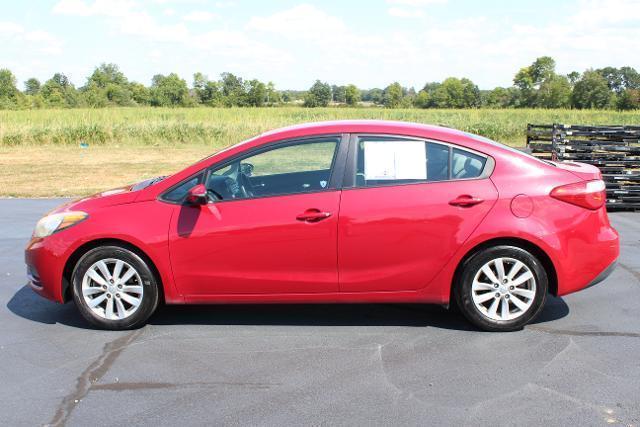 Photo of 2014 Crimson Red Kia Forte