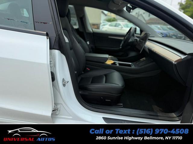 Photo of 2022 Pearl White Multi-Coat Tesla Model 3