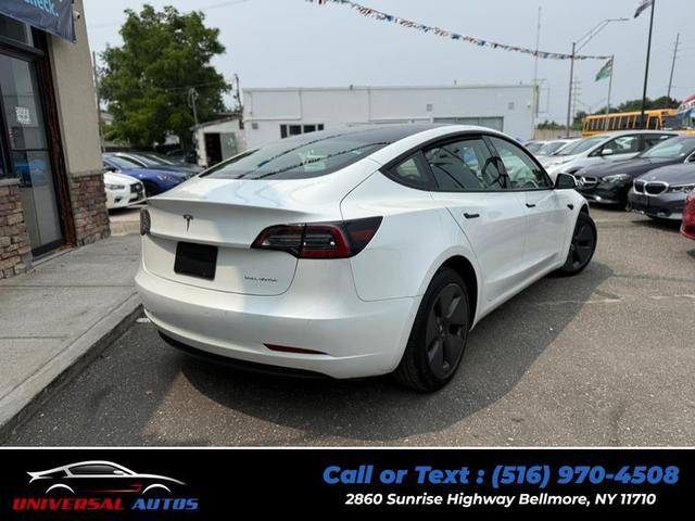 Photo of 2022 Pearl White Multi-Coat Tesla Model 3