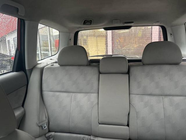 Photo of 2010 Maroon Subaru Forester