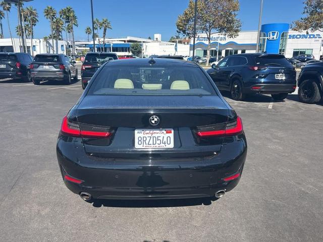 Photo of 2021 Jet Black BMW 330