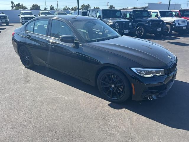 Photo of 2021 Jet Black BMW 330