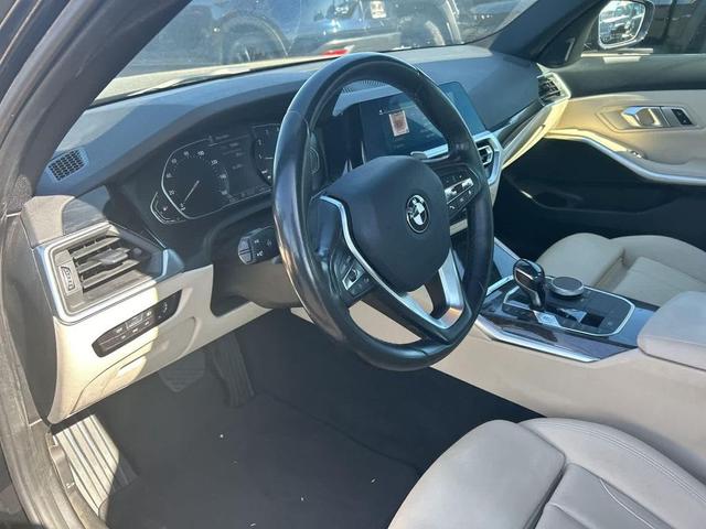 Photo of 2021 Jet Black BMW 330