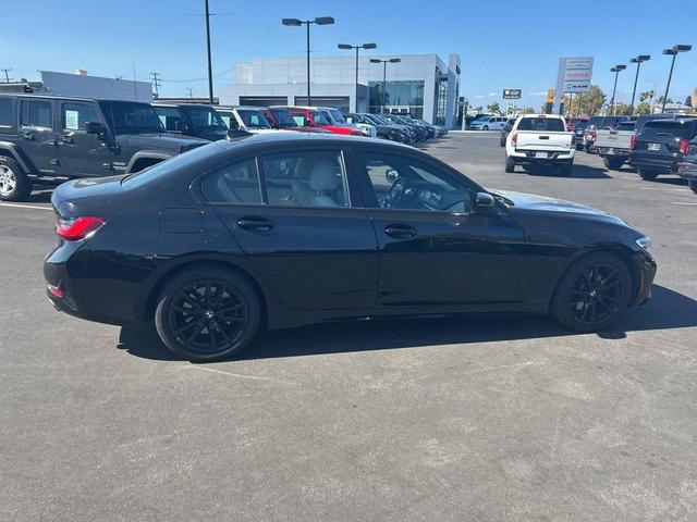 Photo of 2021 Jet Black BMW 330