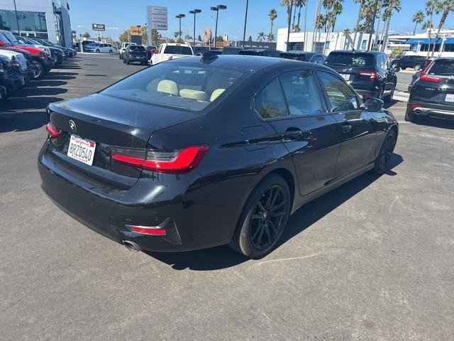 Photo of 2021 Jet Black BMW 330