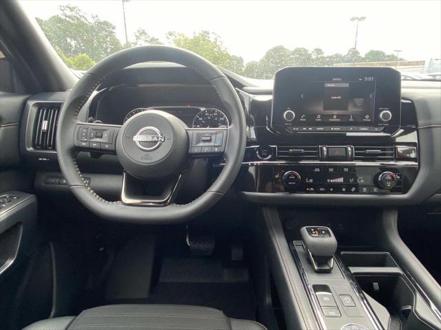 Photo of 2025 Scarlet Ember Tintcoat Nissan Pathfinder