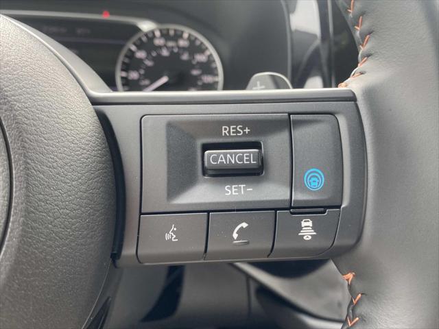 Photo of 2025 Scarlet Ember Tintcoat Nissan Pathfinder